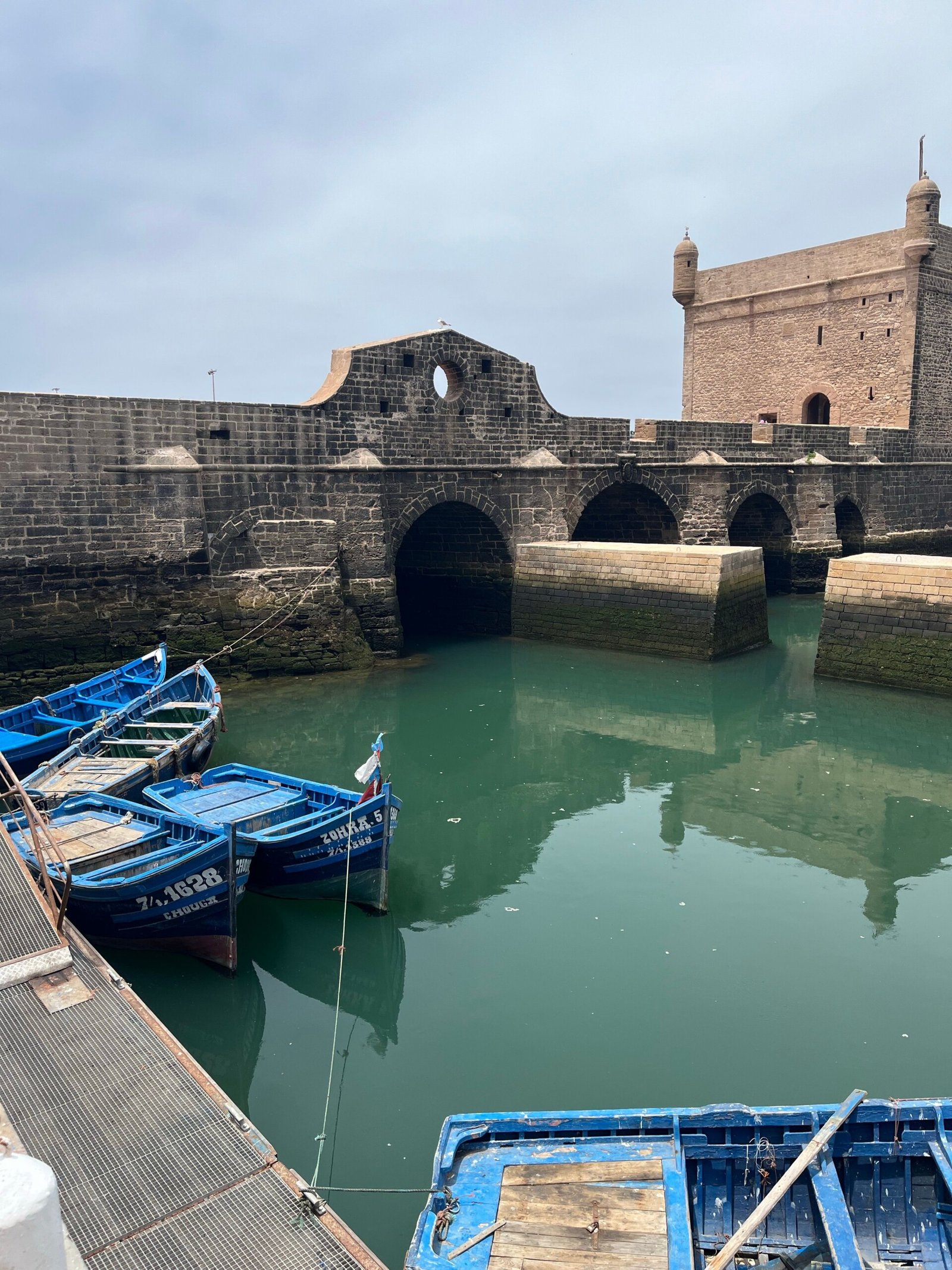 Blue fishing boats in the port of Essaouira